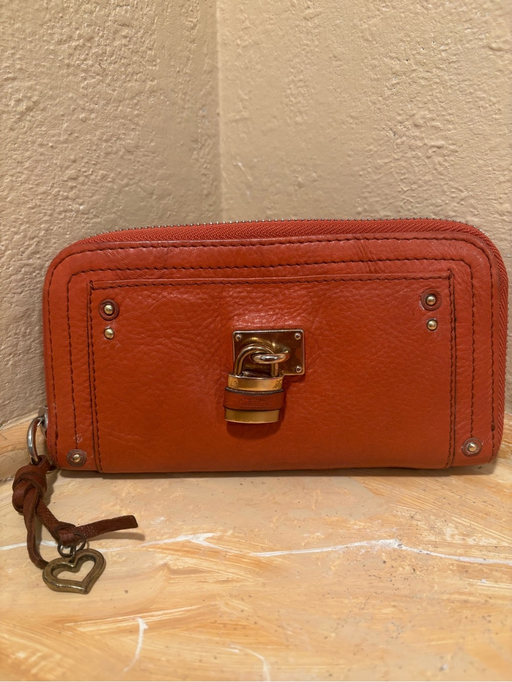 Chloe Orange Leather Zip-Around Wallet with Heart Charm
